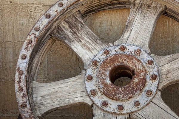 California, Randsburg Old wooden and metal wheel